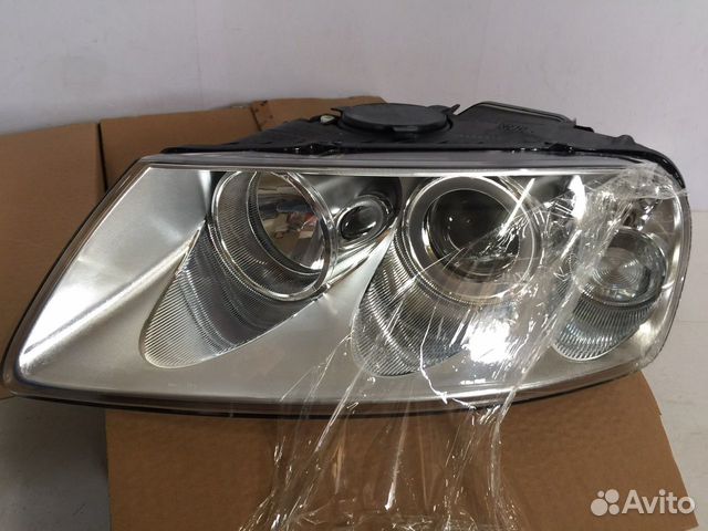 Левая Фара VW touareg 03-07 с электро корректором