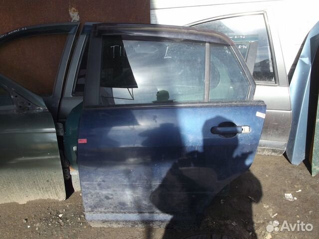 Дверь задняя левая Ниссан Тиида С11 седан