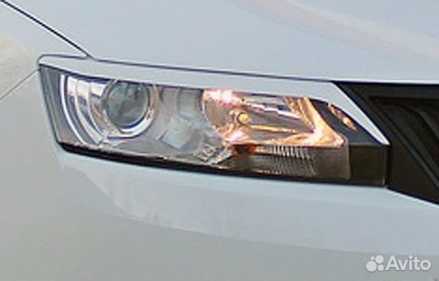 Накладки на фары для Skoda Rapid (фигурные) 12-17