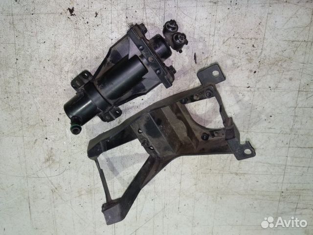 Форсунка омывателя фар левая Mazda 3 BK 2003-2006 Форсунка омывателя фар левая Mazda 3 BK 2003-2006