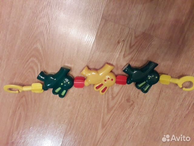 Игрушка на коляску