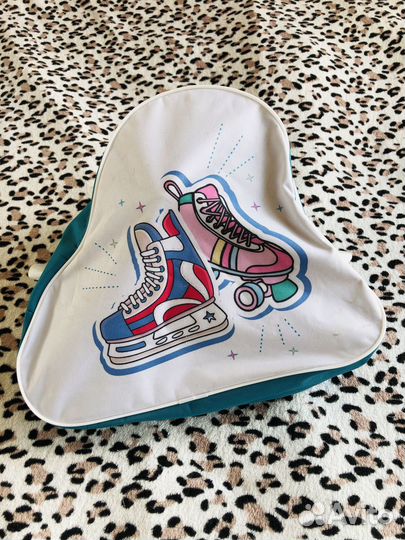 Роликовые коньки