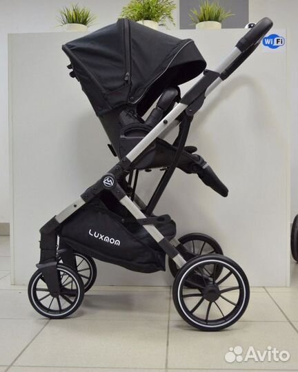 Прогулочная коляска с реверсивным блоком