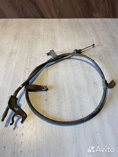 Трос стояночного тормоза левый Hyundai Solaris