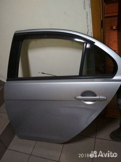 Задняя левая дверь Мицубиси Лансер 10