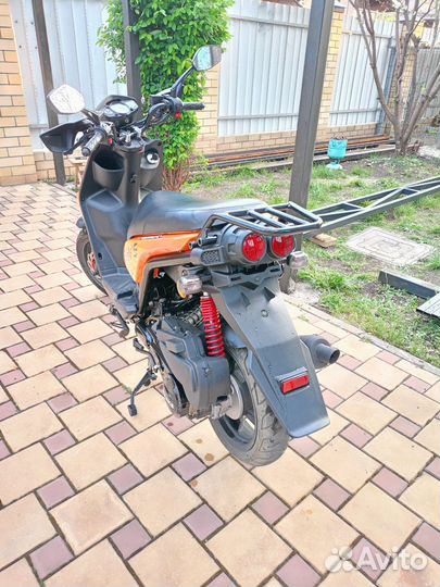 Новый максискутер