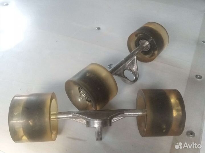 Детали и колëсики для спини борда