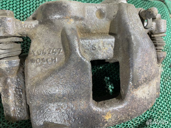 Суппорт передний L R Ford Transit 2.2 2008