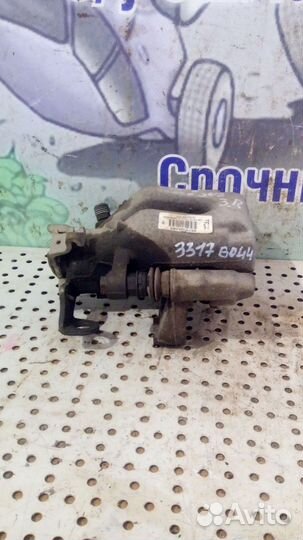 Суппорт тормозной задний правый Peugeot 308