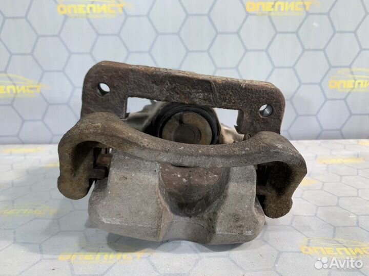 Суппорт тормозной задний левый Opel Insignia A