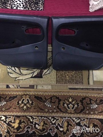 Обшивки задних дверей на ваз2114