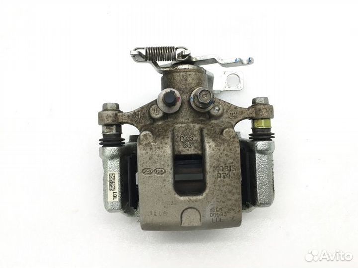 Суппорт задний левый Kia K5 DL3 2.0 2021