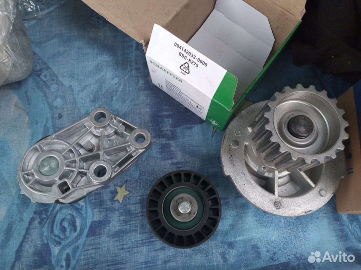 Ролик,прокатной и натяжной и помпа