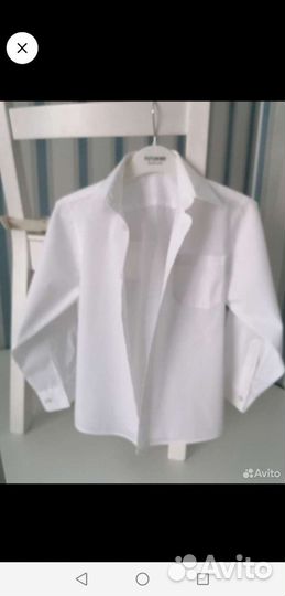 Рубашки на мальчика 128-134