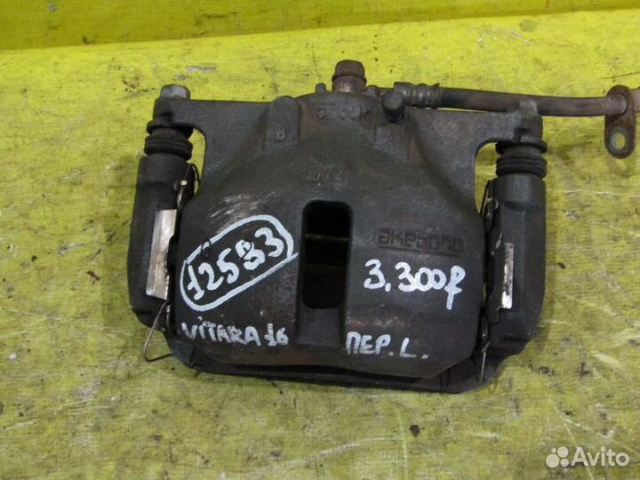 Суппорт передний левый Suzuki Vitara 15-19г 12583