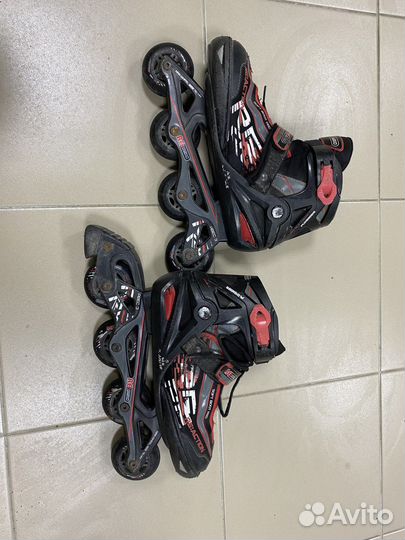 Роликовые коньки