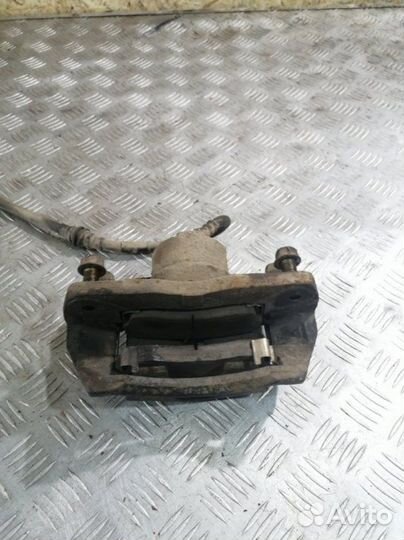 Суппорт тормозной передний правый Kia Spectra LD