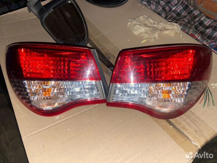 Задние фары almera n16