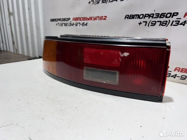 Фонарь задний левый Mazda 323f bg