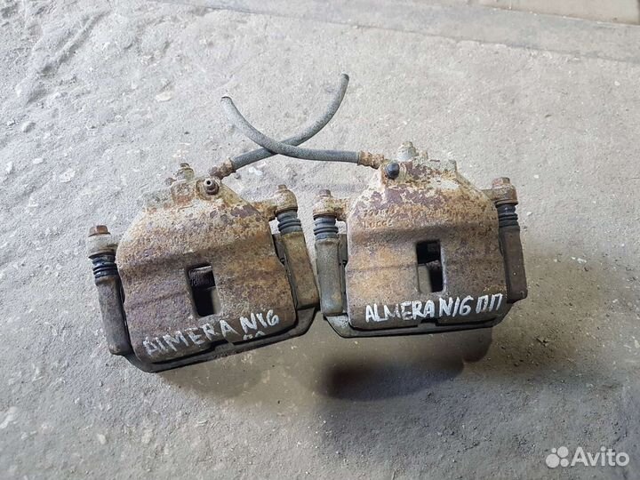 Суппорт передний Nissan Almera N16