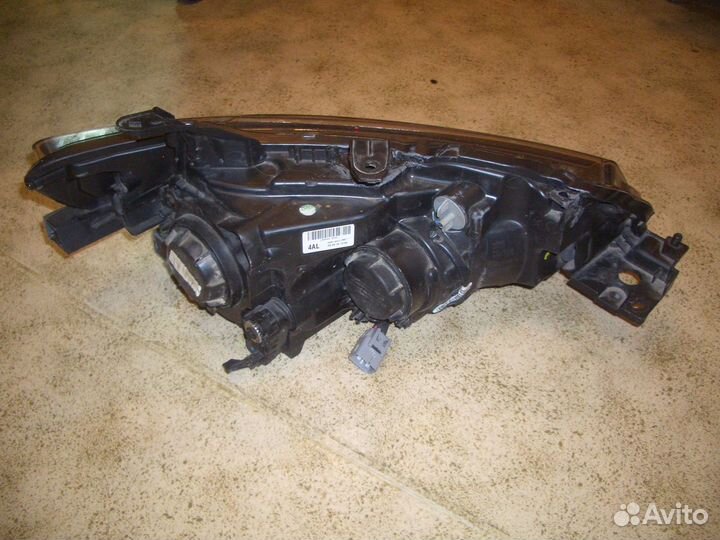 Фара левая Митсубиси Аутлендер с12-15г