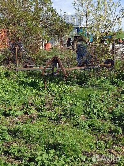 Грабли ворошилки прицепные