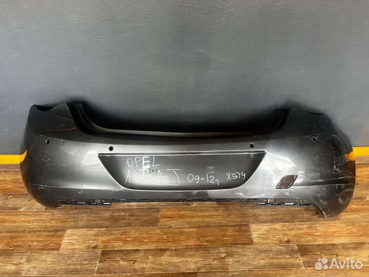 Задний бампер Opel Astra J