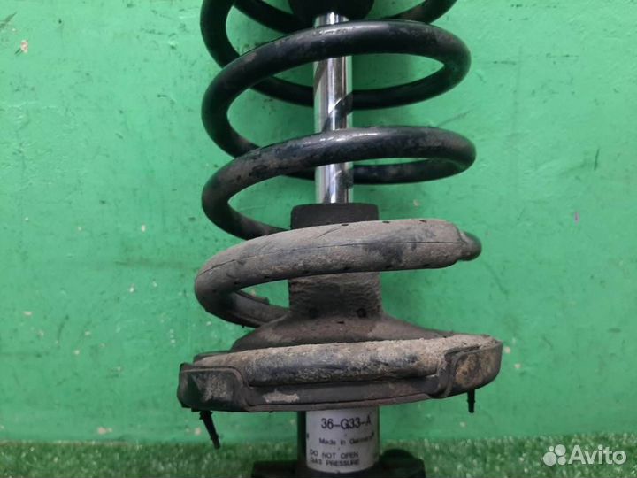 Стойка амортизатора передняя левая Volvo XC90 2006