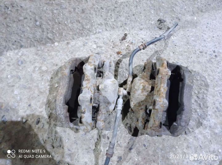 Суппорт передний левый/правый Опель Омега Б