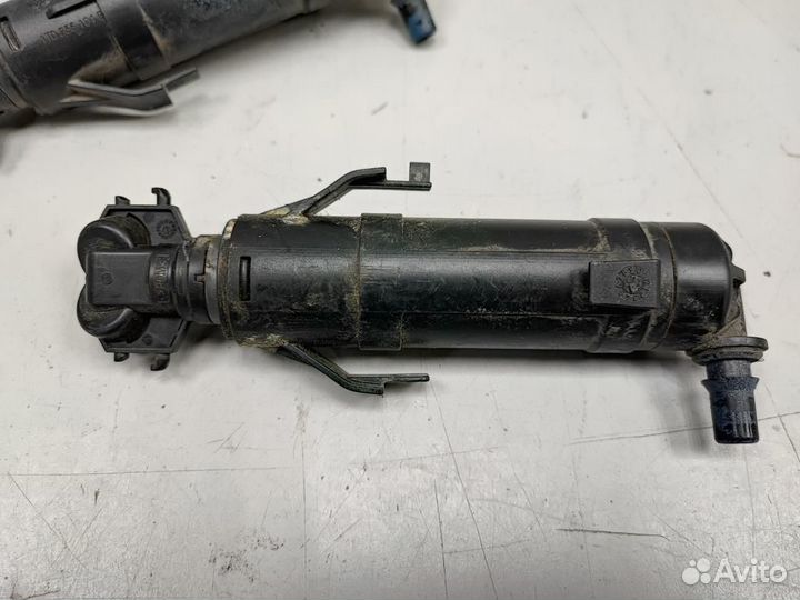 Форсунка омывателя фар левая правая VW touran cadd