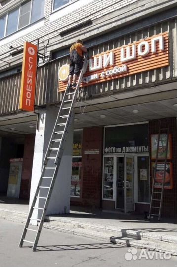 Монтаж наружной рекламы Ozon