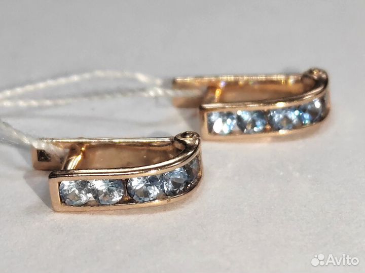 Золотые серьги с камнем