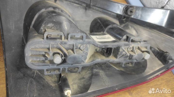 Фонарь заднего хода задний левый Nissan Primera P