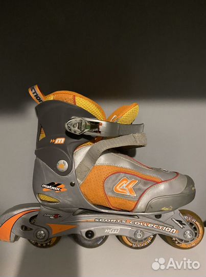 Роликовые коньки