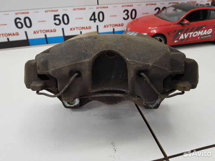 Суппорт передний правый (Opel Astra, Opel Zafira)