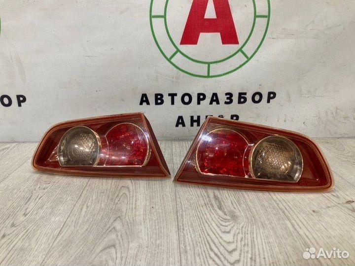 Фонарь в крышку багажника задний Mitsubishi Lancer