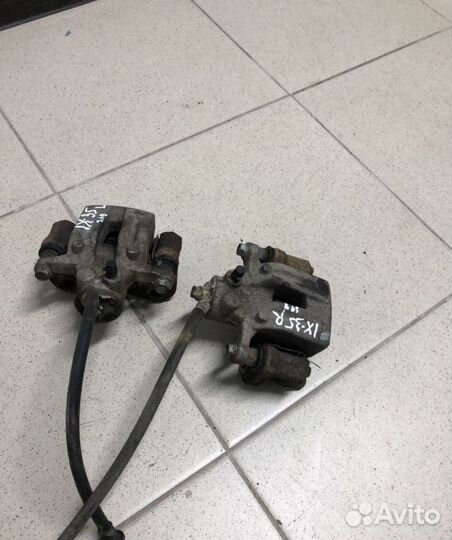 Суппорт задний Kia Sportage 3 Hyundai ix 35