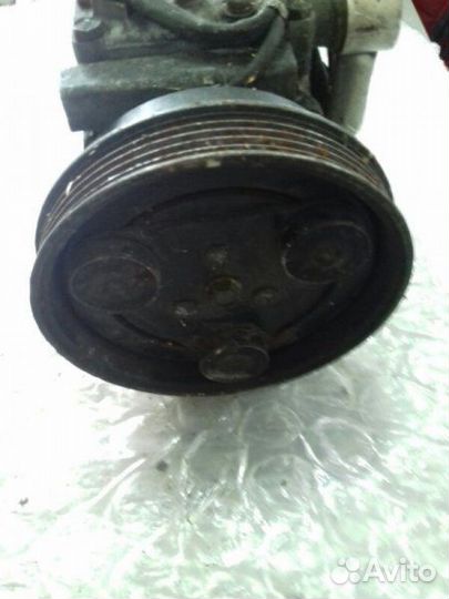 Компрессор кондиционера Mazda 323