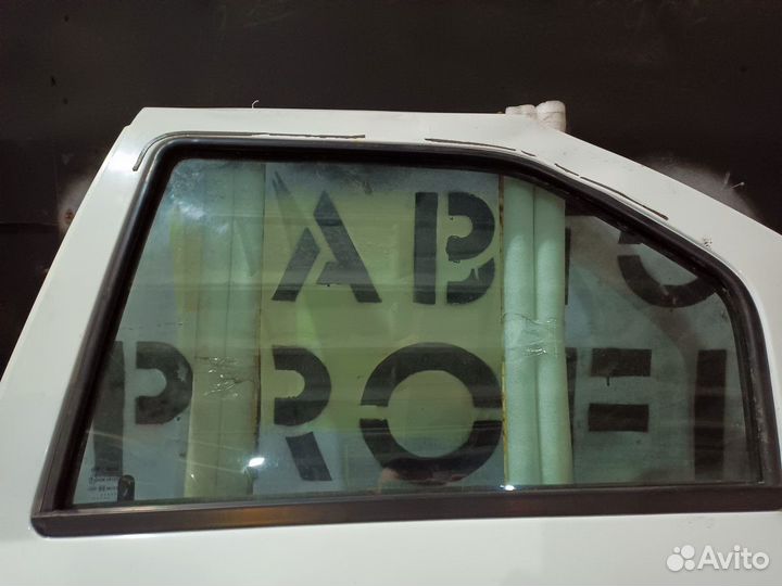Стекло двери задней левой Renault Logan