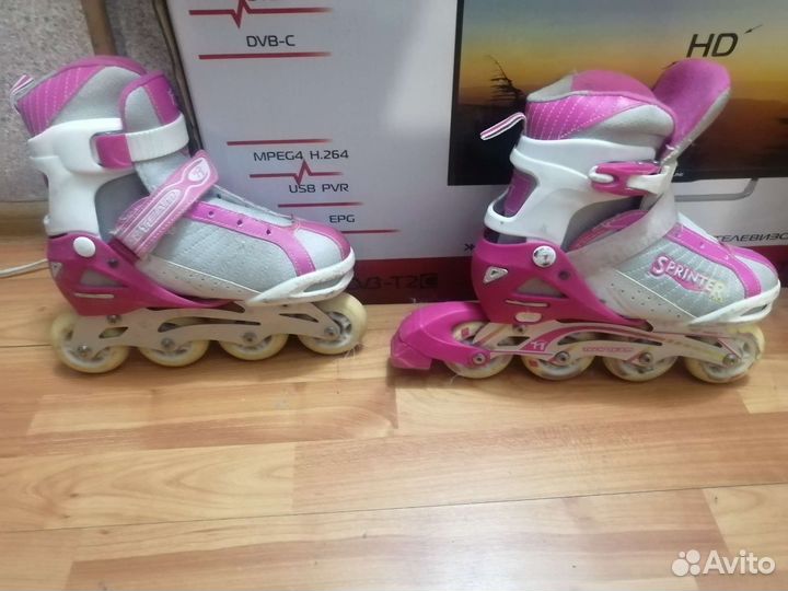 Роликовые коньки