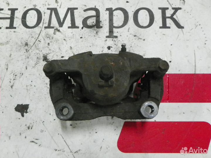 Суппорт тормозной передний правый Nissan X-Trail