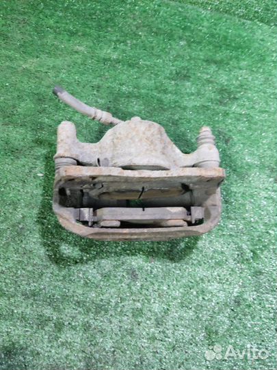 Суппорт тормозной передний левый Hyundai Getz