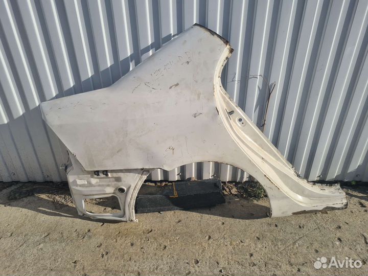 Крыло заднее правое Toyota Corolla 616011H130