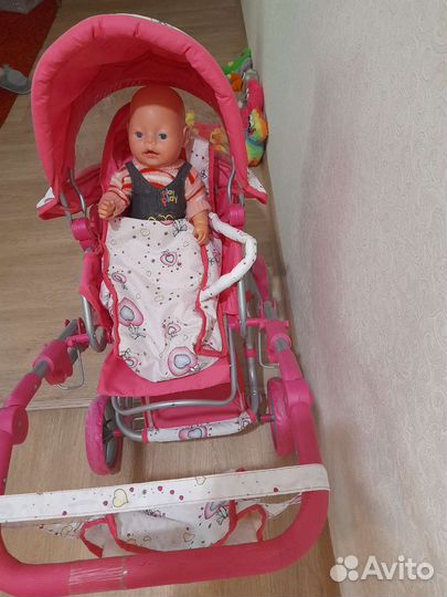 Детская игрушечная коляска