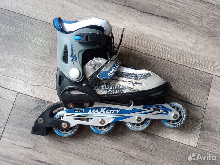 Роликовые коньки