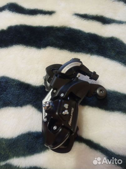 Переключатель задний для горного велосипеда