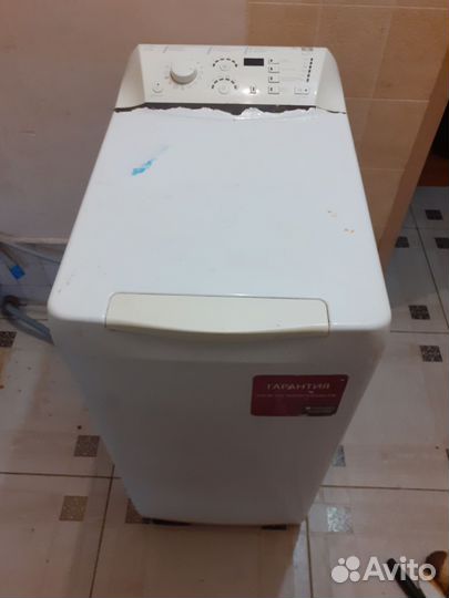 Стиральная машина с вертикальной загрузкой