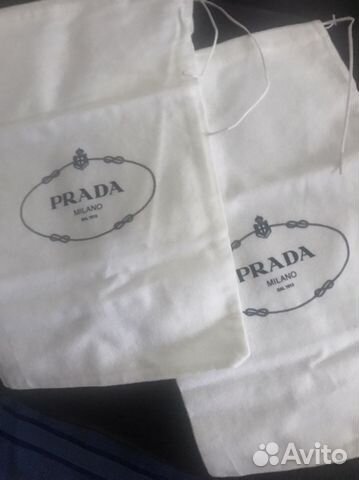 Новые чехлы Prada, косметички и сумка Clarins