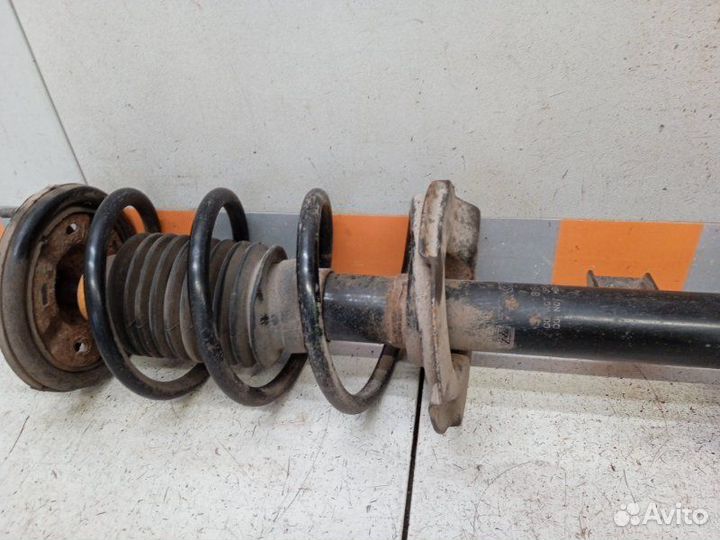 Амортизатор передний левый Mazda Tribute 3.0 2003