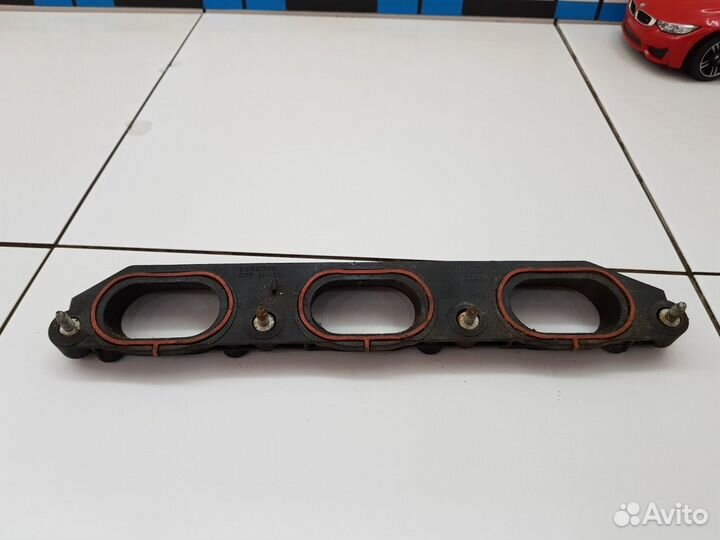 Фланец промежуточный впускного коллектора правый